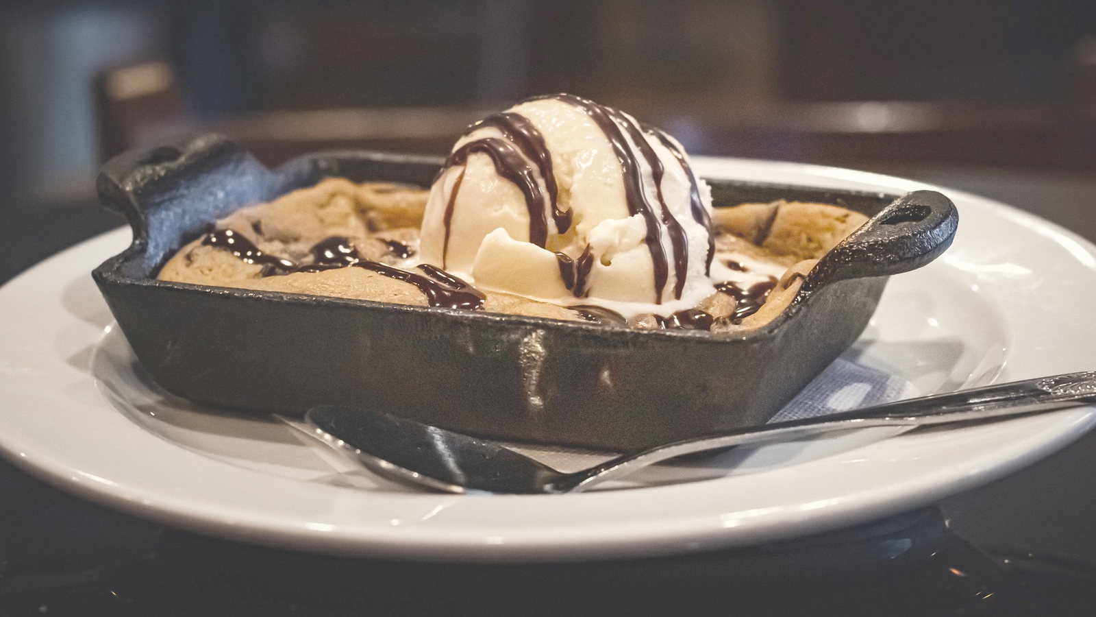 Skillet cookie with ice cream and chocolate sauce. The dessert hero.